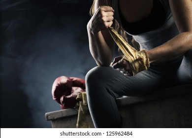 Woman Boxer Wearing White Strap On Wrist