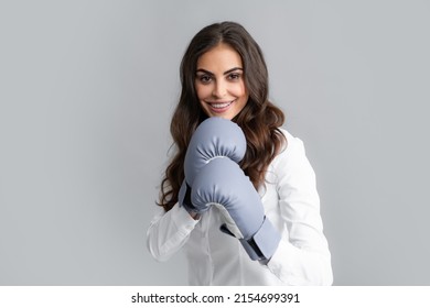 Woman In Boxing Gloves. Strong Happy Business Woman Boss Executive Concept. Businesswoman Wearing Boxing Gloves Ready For The Competition.