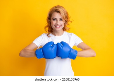 Woman In Boxing Gloves In Yellow Isolated Background. Successful Young Woman Happy For Her Success.