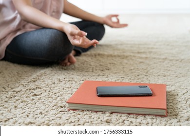 woman break time pose Yoga meditation and turn off mobile phone and disconnect internet 
