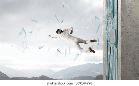 Woman Breaking Through Glass