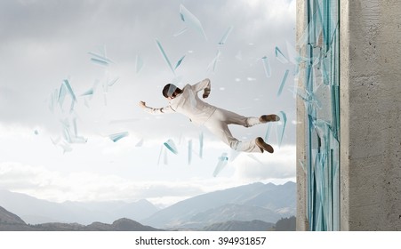 Woman Breaking Through Glass