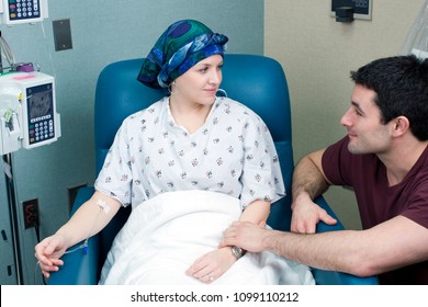 Woman Breast Cancer Patient Receiving Chemotherapy with Husband at Side
