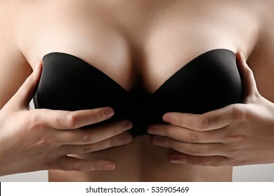 Woman breast, closeup. Plastic correction and surgery concept.
