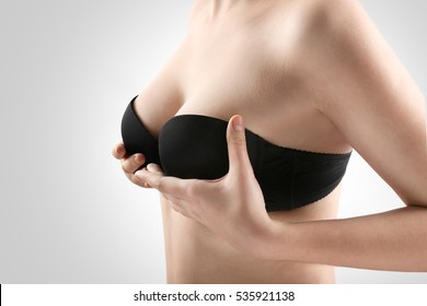 Woman breast, closeup. Plastic correction and surgery concept.