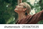 Woman breathing fresh air outdoors