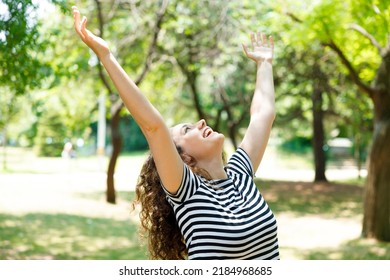 Woman Breathing Fresh Air Outdoors In Summer, Celebrating While Out In Nature