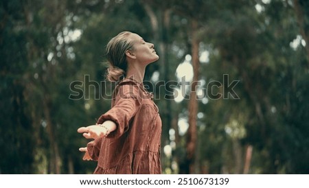 Woman breathing fresh air outdoors