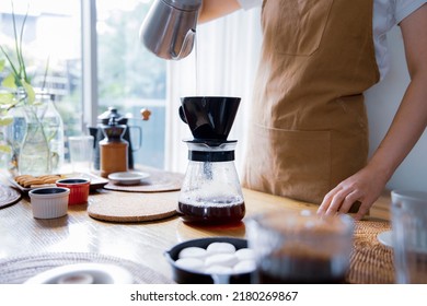 Woman Brewing Coffee In The Room