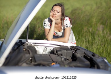 Woman And Broken Car