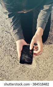 Woman With A Broken Cracked Phone Screen