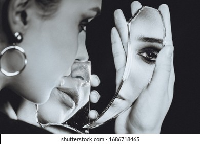 Woman With Broken Self-image Mirror On Black Background, Black And White Portrait
