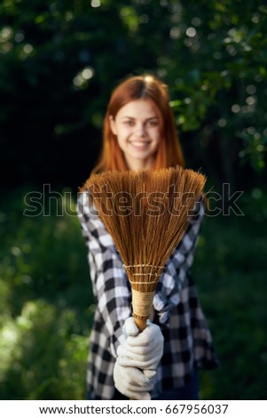 Woman with a broom                               