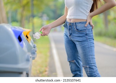 A Woman Brought The Plastic Water Bottle That Has Been Drained Of Water, Sorted Into Prepared Bins For Storage For Recycling