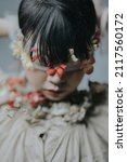 woman in a brown dress with flower at halloween day. Concept - cover for the book.