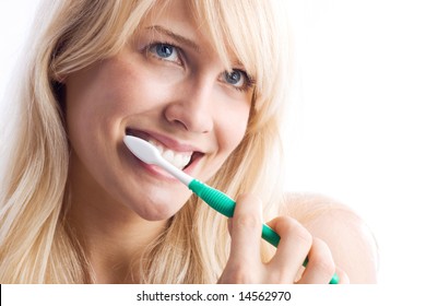 Woman Brushing Her Teeth, Studio White