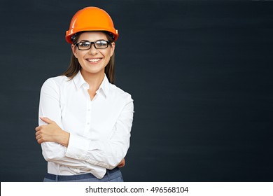 Woman Builder Isolated Portrait With Protect Helmet. Black Background.