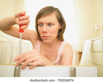 Woman Building Furniture