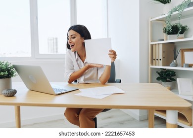 Woman Business Freelancer Via Video Link Via Laptop Shows Papers Online For Startup, Smile And Happiness In Employee Chat