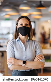 Woman Business Owner Wearing Face Mask After Reopening Restaurant, Arms Folded