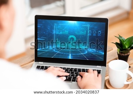 Woman Busy Typing On Her Laptop Beside Coffe Mug And Plant Accomplishing Work From Home. Girl Encoding Minicomputer Next To Cap And Flower Finishing Remote Jobs.