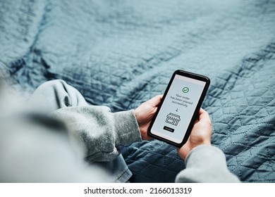 Woman buying product in online shop. Person paying using online mobile payment app. Customer ordering item in online store using smartphone. Online shopping from home. Order confirmation on screen