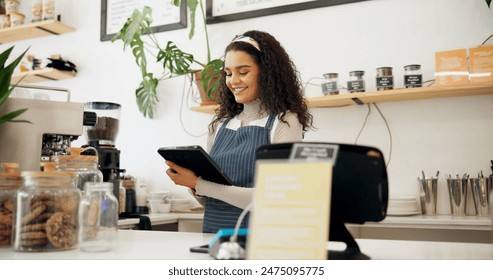 Woman, cafe and barista with order on tablet for sale, ecommerce and service at coffee shop. Female person, networking and waitress with technology for website, communication or online menu update - Powered by Shutterstock