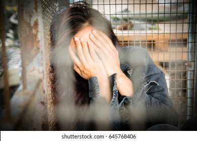 Woman In The Cage, Human Trafficking Concept,Blurry Portrait