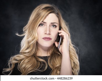 Woman Calling With A Cell Phone.