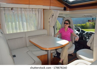 Woman In Camper (RV) Interior, Family Travel And Vacation 