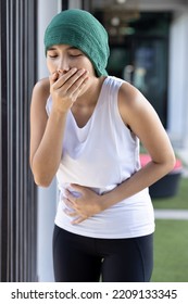 Woman Cancer Patient Suffering From Radiation Nausea And Vomiting, Negative Side Effect Due To Chemotherapy Or Radiation Therapy Breast Cancer Treatment