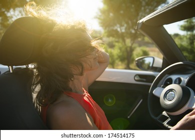 Woman In The Car. Driving Pleasure