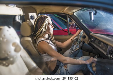 Woman In Car Indoor Keeps Wheel Looking At Far Away Idea Race Driver Police Blocked The Road And Headlights Shining In The Face Dusk Light At The Night 