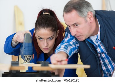 Woman As Carpenter During Apprenticeship Lesson