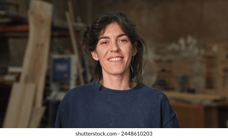 Woman carpenter portrait. Feminist girl process wood. Male carpentry work skill. Female joiner woodwork. Feminism worker smile. Person woodworker look camera. Diy master class workshop. Job project. - Powered by Shutterstock