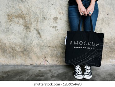 Woman Carrying A Black Tote Bag Mockup