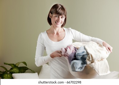 Woman Carrying Laundry Basket