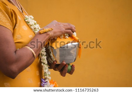 A Woman Carrying a Milk Pot