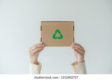 Woman Carrying Paper Box Concept Of Reuse, Recycling Object To Zero Waste. Concept Of Sustainability Using Of Recycled Paper Cardboard Box To Save The Global Warming.