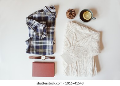 Woman Casual Fashion Set Flat Lay. Plaid Shirt, Knitted Sweater, Watch And Book On White Background. Stylish Outfit Top View.