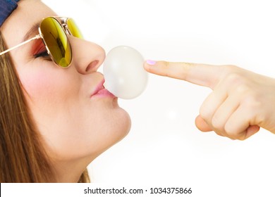 Woman Casual Style Teen Girl Sunglasses Doing Bubble With Chewing Gum Closeup. Youth Style