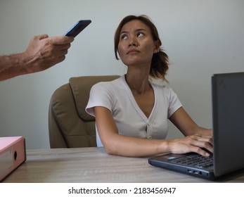 Woman Catches Man Taking Down Blouse Photos While She Works On Computer.    