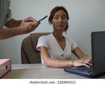 Woman Catches Man Taking Down Blouse Photos While She Works On Computer.     