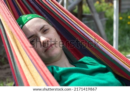 Similar – After this Photocase shock, I have to take a nap in the hammock.