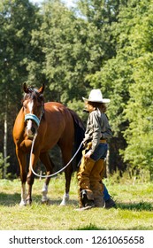 Woman Cawboy And Horse