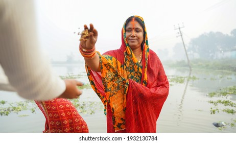 Woman Celebrating Chhath Pooja In Bihar