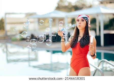 
Woman Celebrating Independence at the Pool Summer Party. Happy girl enjoying national holiday partying by the swimming pool
