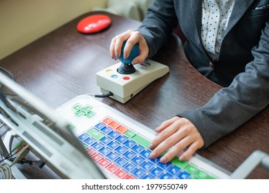 Woman With Cerebral Palsy Works On A Specialized Computer.