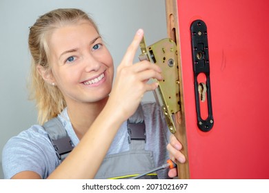 A Woman Changing The Lock