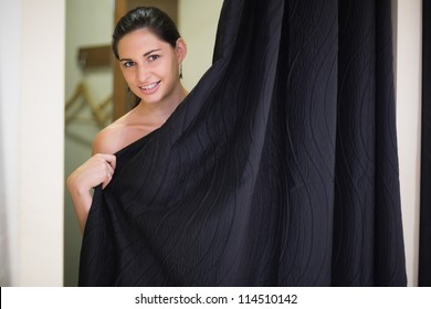 Woman In The Changing Room Of Clothing Store